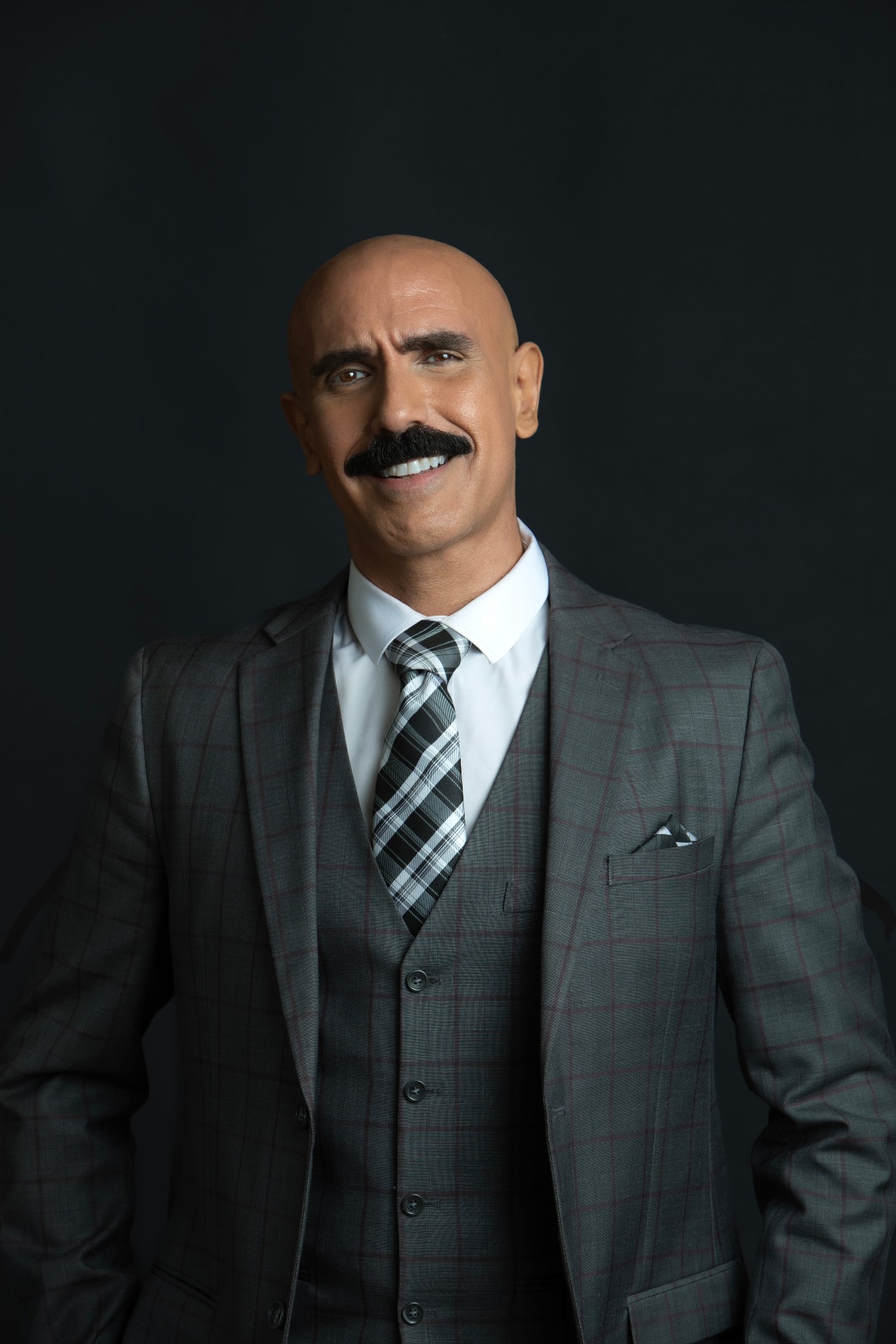 Character portrait of Gabriel Pablo Axarlian in tailored suiting